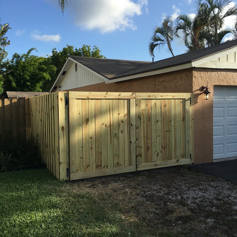 a nice wood fence being installed in Wichita Texas