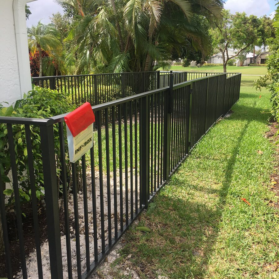 A new black iron fence installation in Wichita Falls